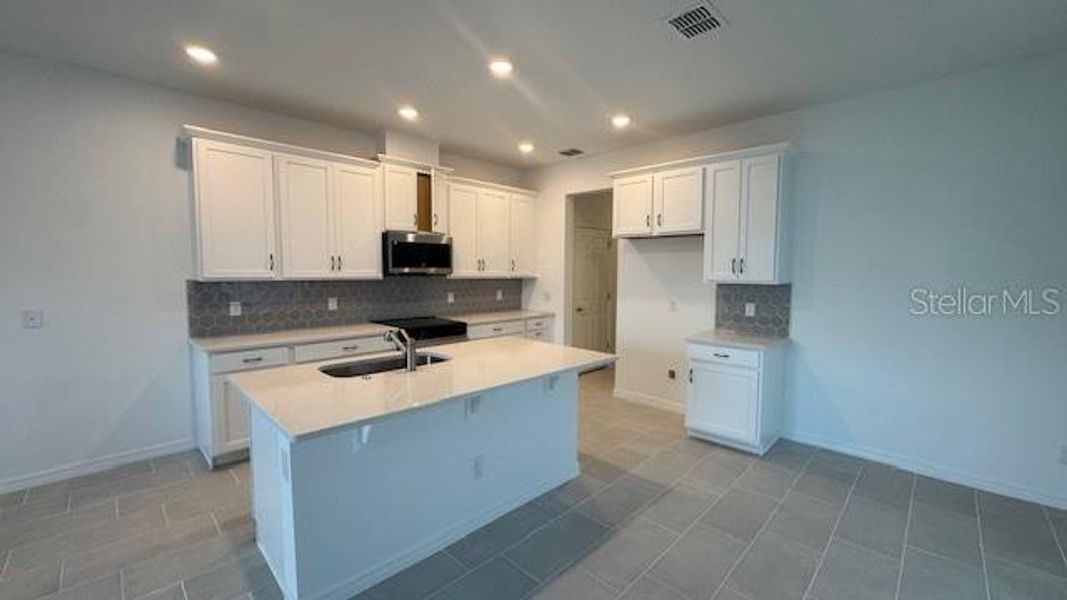Furnished interior view inside a new home in Cypress Bluff, Groveland (Image 7).