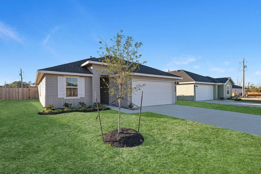 Front exterior of a new home in Reserve at Mallard Lakes, Orange, TX, highlighting curb appeal (Image 15). Front exterior of a new home in Reserve at Mallard Lakes, Orange, TX, highlighting curb appeal (Image 15).