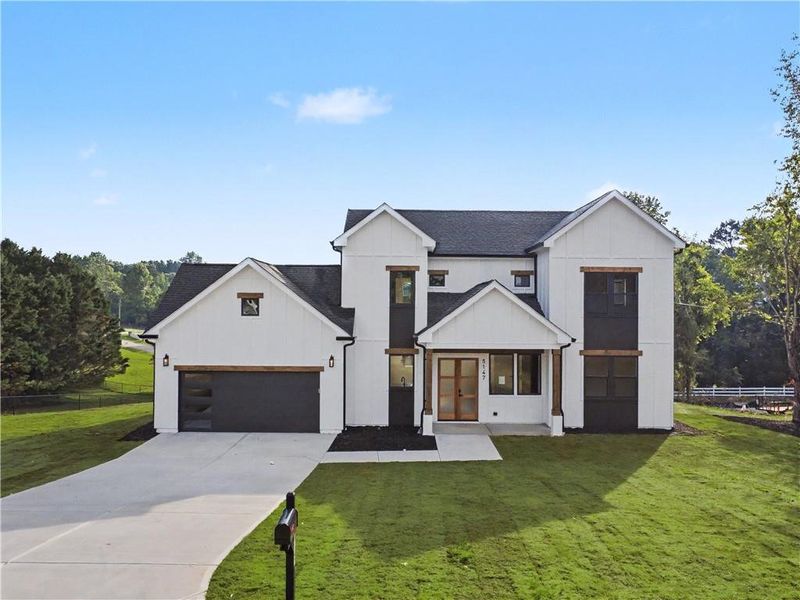Front exterior of a new home in , Gainesville, GA, highlighting curb appeal (Image 19).