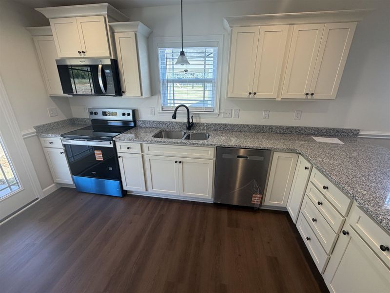 Furnished interior view inside a new home in Stones Throw, Inman (Image 5).