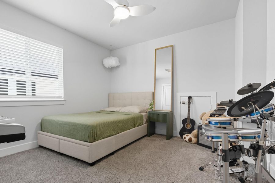 Two of two secondary bedrooms upstairs.