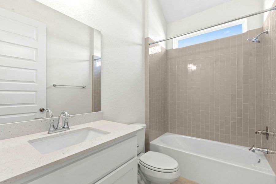 Furnished interior view inside a new home in University Heights, Round Rock (Image 12).