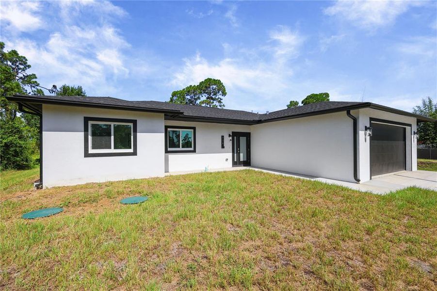 Exterior details and patio area of a home in , Lehigh Acres (Image 19). Exterior details and patio area of a home in , Lehigh Acres (Image 19).