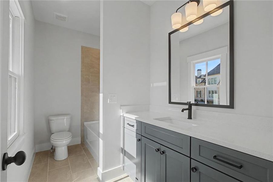 Furnished interior view inside a new home in Malone's Pond, Ball Ground (Image 15).