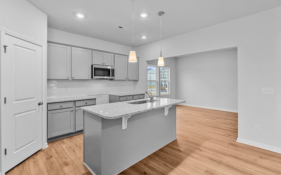 Furnished interior view inside a new home in Fieldstone, Lexington (Image 9).
