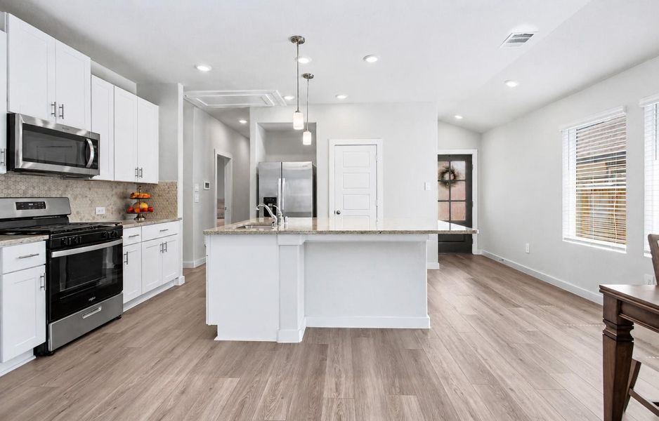 The bright and inviting entryway leads into the open-concept living spaces. The bright and inviting entryway leads into the open-concept living spaces.