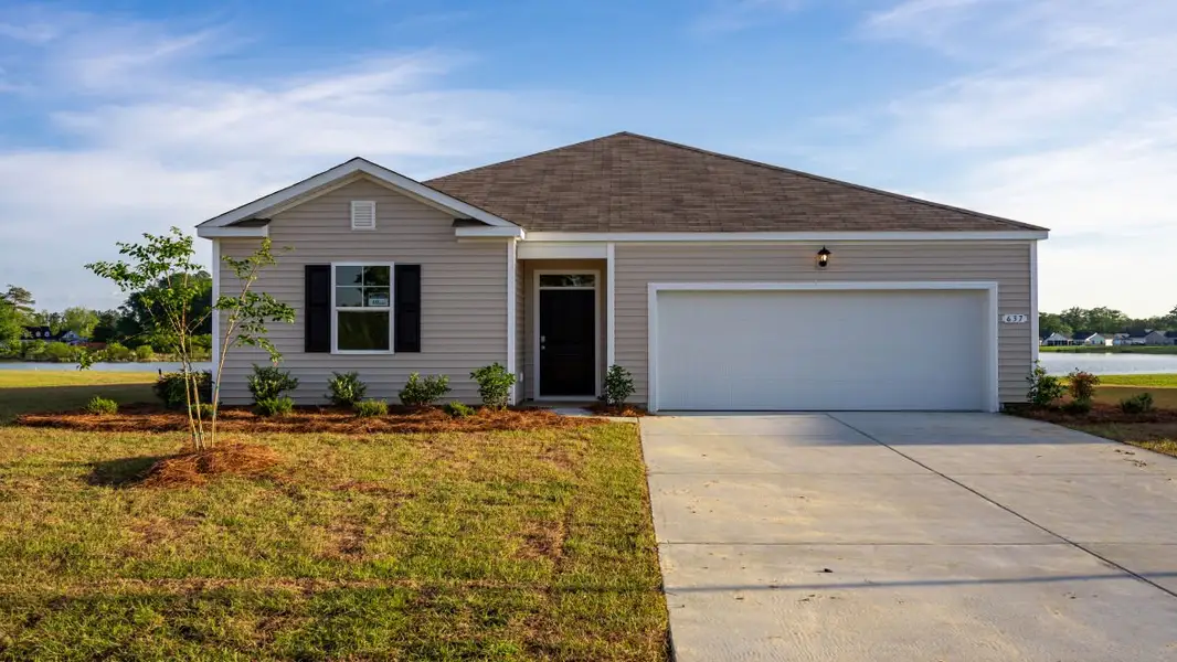Representative exterior photo of a completed home built from the KERRY by D.R. Horton in Sandridge Park, Little River, SC (Image 1).