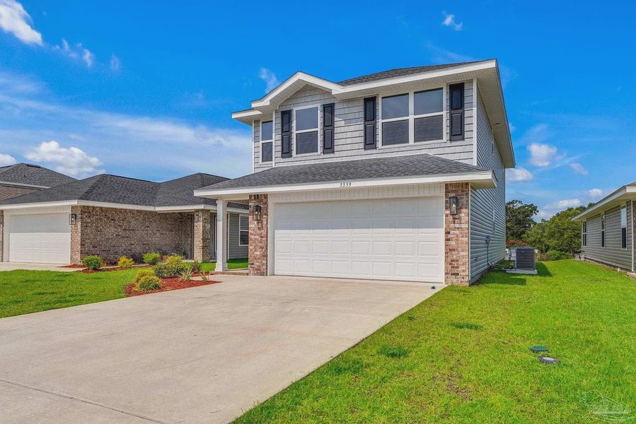 Front exterior of a new home in Allison Acres, Cantonment, FL, highlighting curb appeal (Image 18). Front exterior of a new home in Allison Acres, Cantonment, FL, highlighting curb appeal (Image 18).