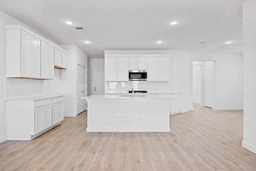 Furnished interior view inside a new home in Lakeside at Tessera, Lago Vista (Image 7).