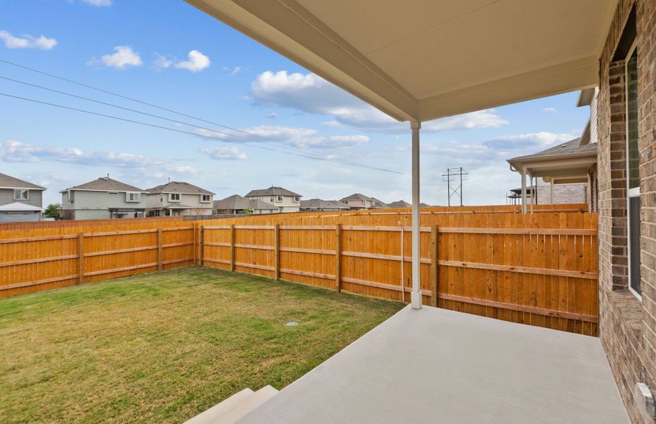 Exterior details and patio area of a home in Crosswinds, Kyle (Image 7).