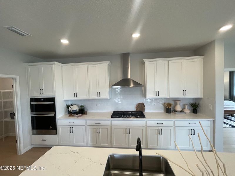 Furnished interior view inside a new home in The Cypress Series at Reserve East, Flagler Beach (Image 13). Furnished interior view inside a new home in The Cypress Series at Reserve East, Flagler Beach (Image 13).