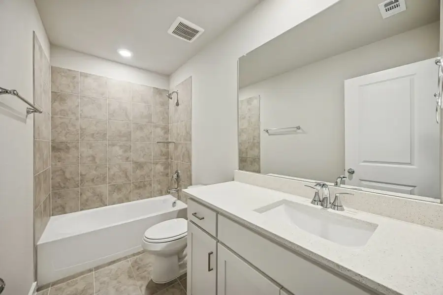 Representative furnished interior of a home built from the The Elm by Lillian Custom Homes in Hickory Hill, Sherman (Image 14).