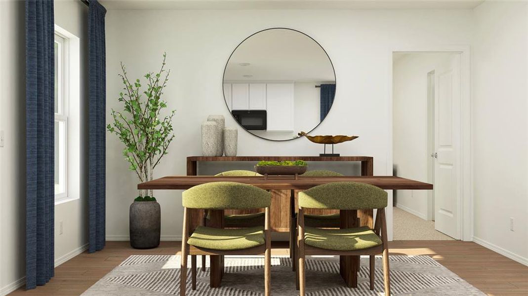 Dining space featuring light hardwood / wood-style flooring