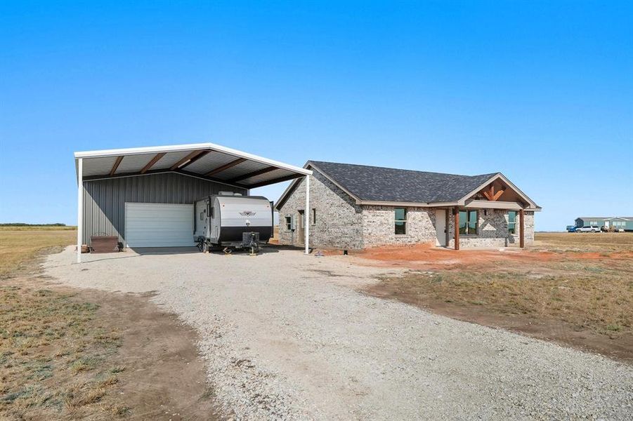 Front exterior of a new home in , Hawley, TX, highlighting curb appeal (Image 20).