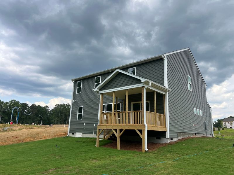 Exterior details and patio area of a home in White Oak Creek Crossing, Angier (Image 21). Exterior details and patio area of a home in White Oak Creek Crossing, Angier (Image 21).
