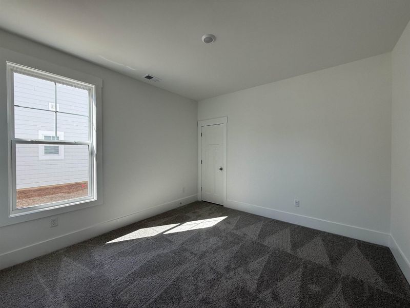 Spacious, unfurnished interior of a new home in Westwood Reserve, Conway (Image 27).