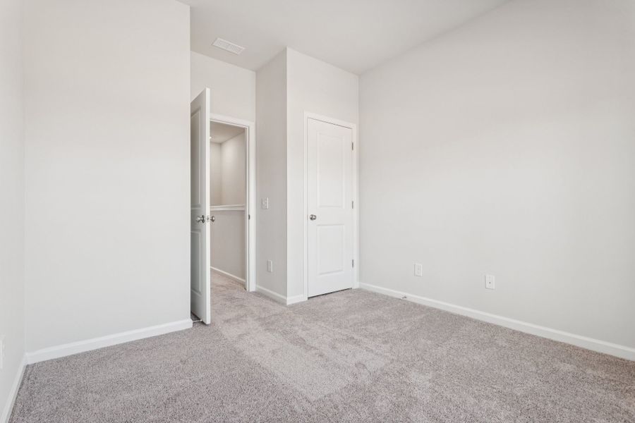 Spacious, unfurnished interior of a new home in Lakeview Village, Charlotte (Image 18). Spacious, unfurnished interior of a new home in Lakeview Village, Charlotte (Image 18).