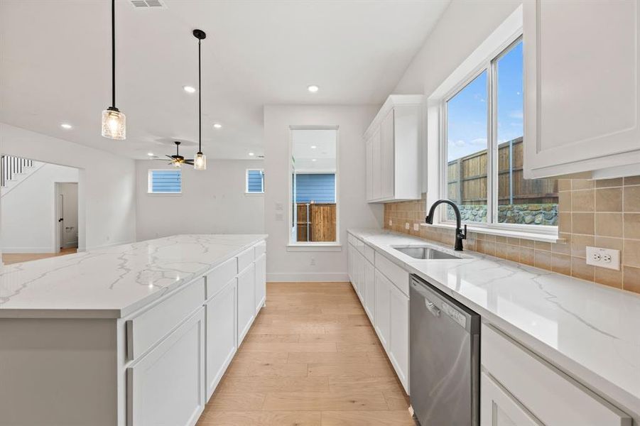 Furnished interior view inside a new home in North Square at Uptown, Celina (Image 14).