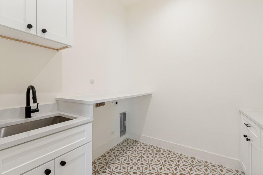 Streamlined storage solutions and clean lines define this versatile utility space, ideal for any home.