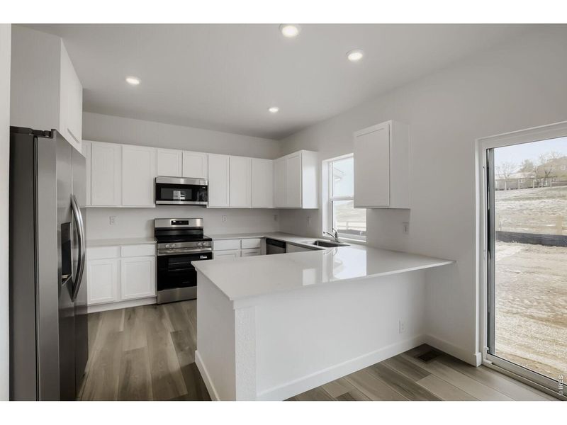 Furnished interior view inside a new home in Prairie Song, Windsor (Image 6).