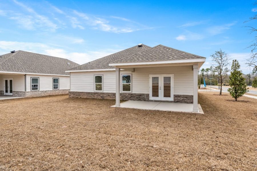 Exterior details and patio area of a home in Natureview, Freeport (Image 28).