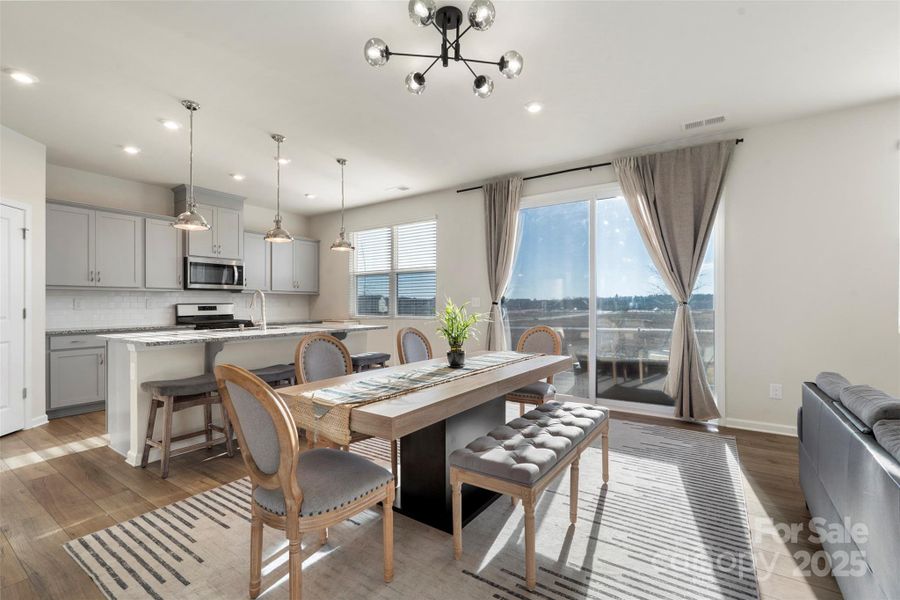 Furnished interior view inside a new home in Waxhaw Landing, Monroe (Image 17).
