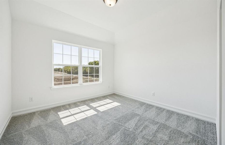 Spacious secondary bedroom with large windows Spacious secondary bedroom with large windows