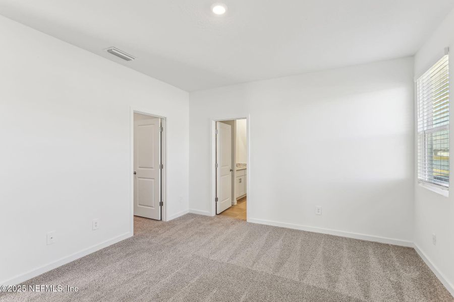 Spacious, unfurnished interior of a new home in Lakes at Bella Lago - Signature Series, Green Cove Springs (Image 27). Spacious, unfurnished interior of a new home in Lakes at Bella Lago - Signature Series, Green Cove Springs (Image 27).