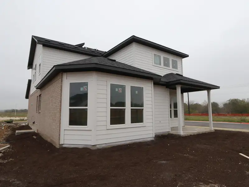 Exterior details and patio area of a home in Estancia West, Manchaca (Image 6).