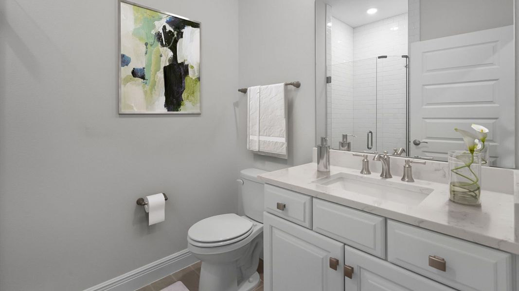 Representative furnished interior of a home built from the BELLMORE by D.R. Horton in Waterleigh, Winter Garden (Image 10).