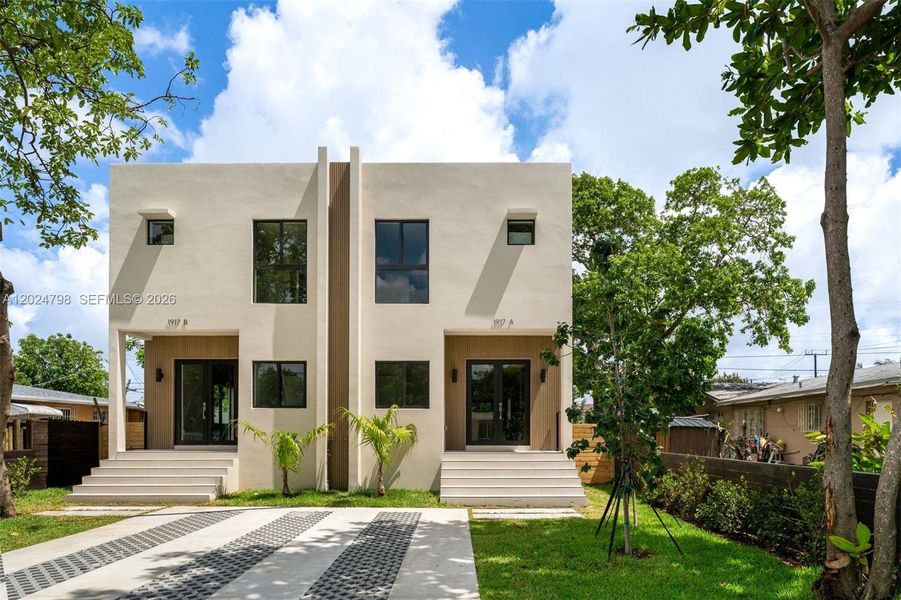 Front exterior of a new home in , Miami, FL, highlighting curb appeal (Image 27).
