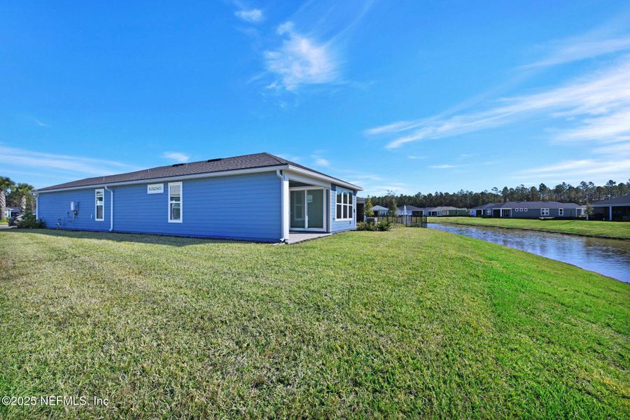 Exterior details and patio area of a home in Del Webb Wildlight, Wildlight (Image 4). Exterior details and patio area of a home in Del Webb Wildlight, Wildlight (Image 4).