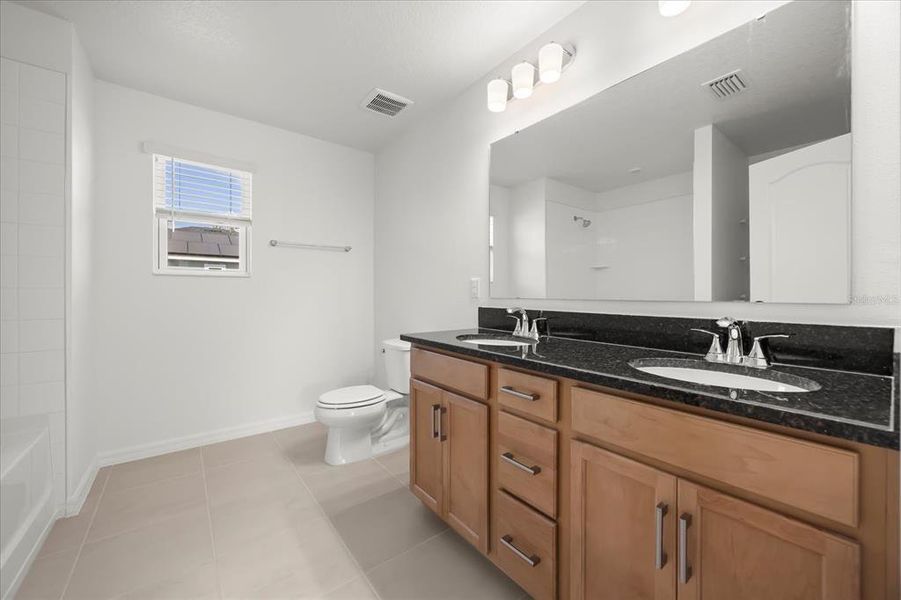 Furnished interior view inside a new home in Hickory Ranch, Auburndale (Image 9).