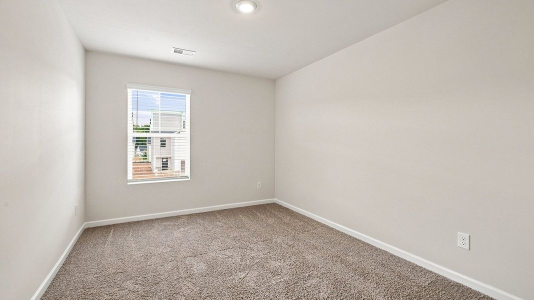 Spacious, unfurnished interior of a new home in Shoal Creek, Hampton (Image 22).