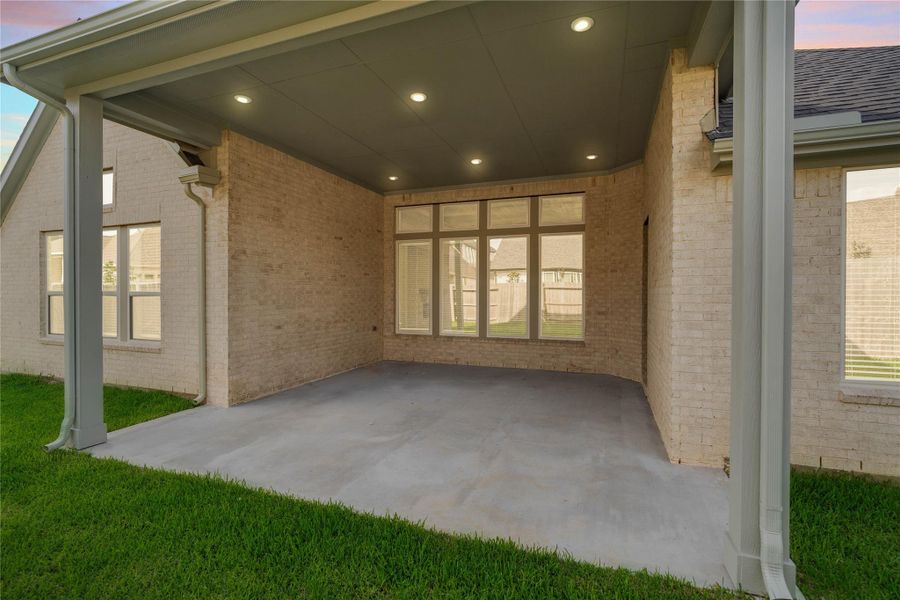 Step outdoors to this serene backyard for a truly peaceful retreat. The property is secured by a stately, full-brick back wall that provides both durability and a premium aesthetic. This low-maintenance green space is perfect for weekend gatherings, pets, or creating your own private garden oasis.