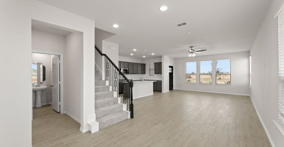 Representative exterior photo of a completed home built from the Caddo by Impression Homes in Creekshaw, Royse City, TX (Image 13).