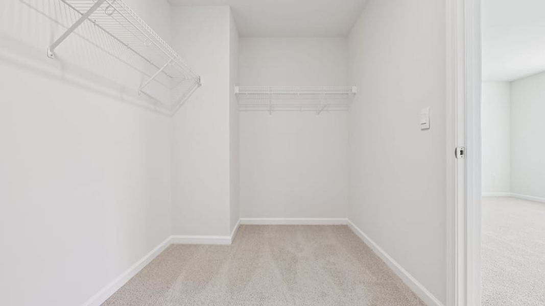 Spacious, unfurnished interior of a new home in Gretchen Pines, West End (Image 18).