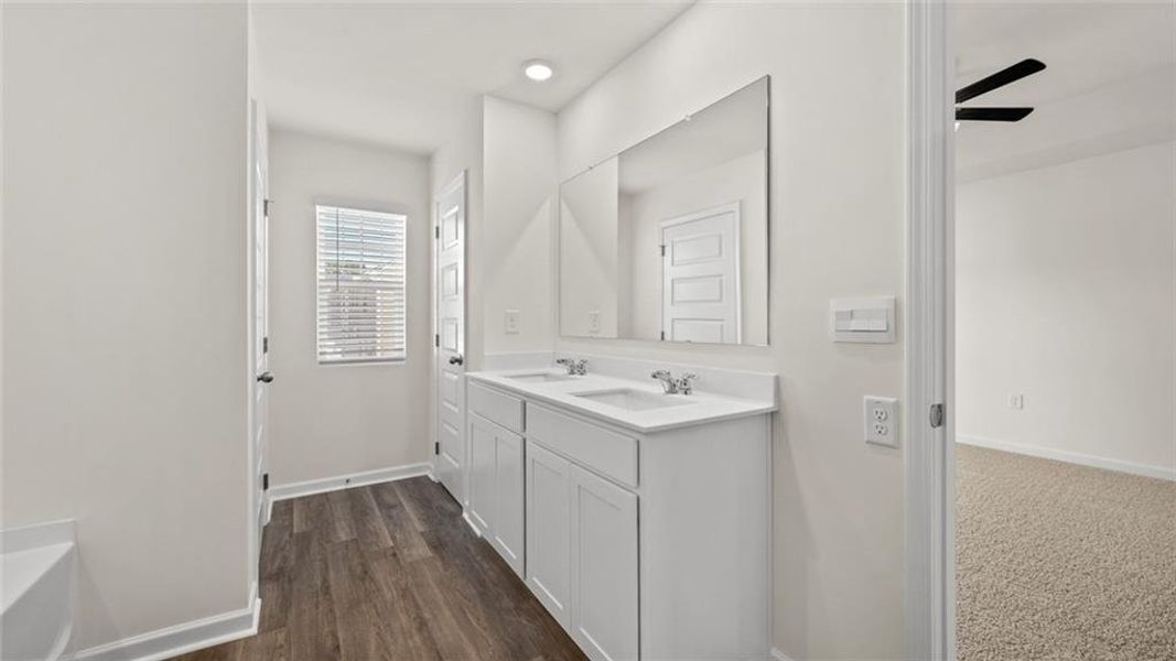 Furnished interior view inside a new home in Inverness at Sugarloaf, Lawrenceville (Image 5).