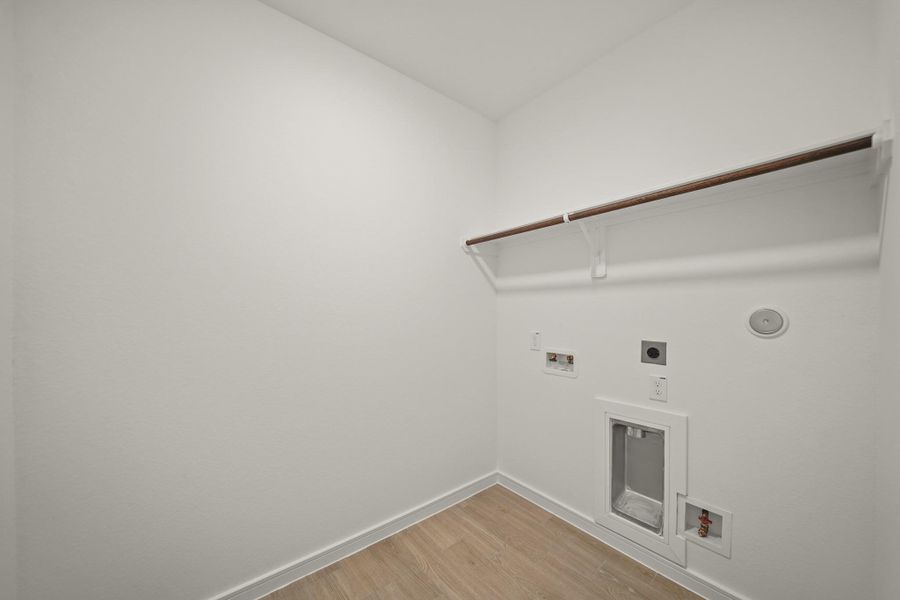 Laundry room (*Photo not of actual home and used for illustration purposes only.)