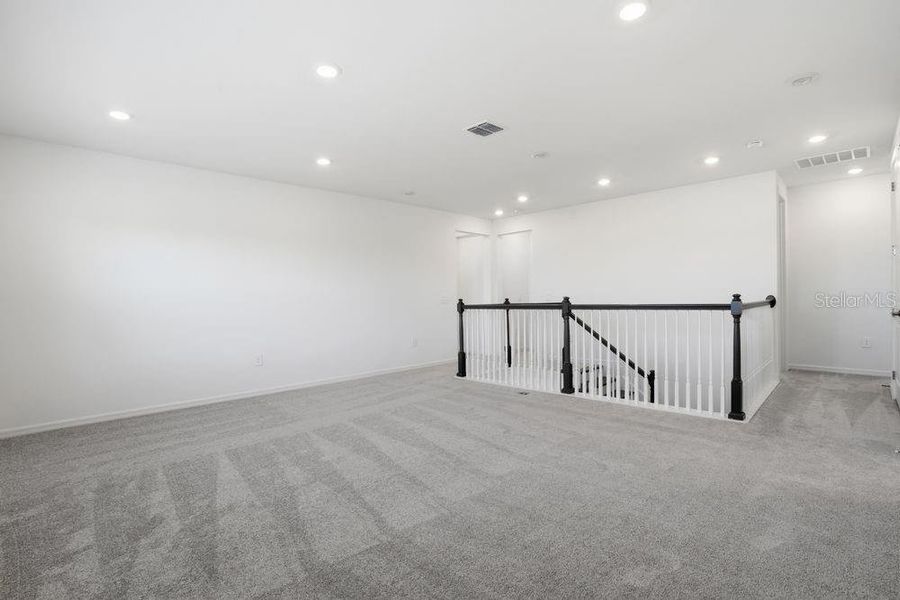 Spacious, unfurnished interior of a new home in Firethorn, Parrish (Image 25).