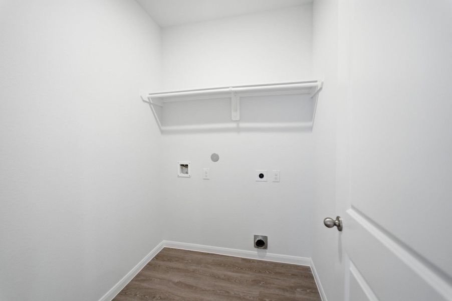 Spacious, unfurnished interior of a new home in The Pines at Seven Coves, Willis (Image 22).