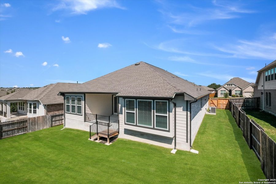 Front exterior of a new home in Foxbrook, Cibolo, TX, highlighting curb appeal (Image 19). Front exterior of a new home in Foxbrook, Cibolo, TX, highlighting curb appeal (Image 19).