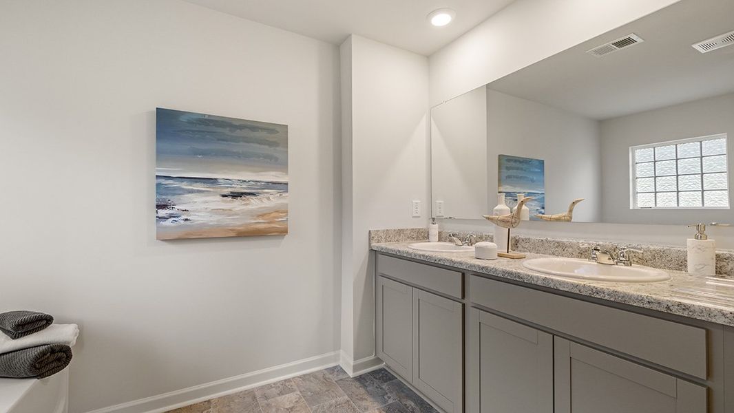 Representative furnished interior of a home built from the ROBIE by D.R. Horton in Pointe Park, Union City (Image 24).