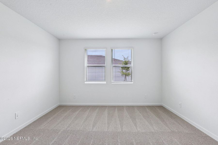 Spacious, unfurnished interior of a new home in Flagler Village - Signature Series, Palm Coast (Image 22).