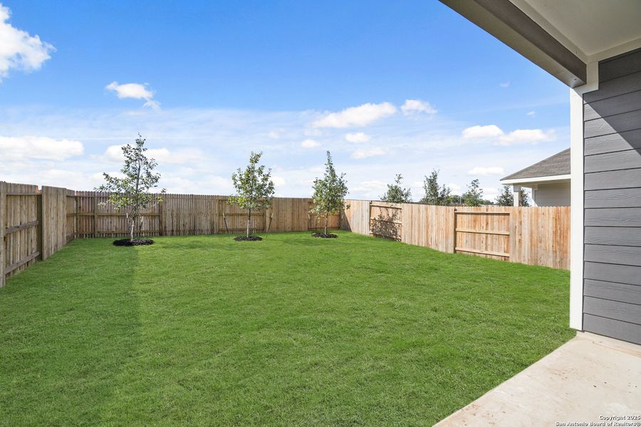 Exterior details and patio area of a home in Timber Creek, San Antonio (Image 21).