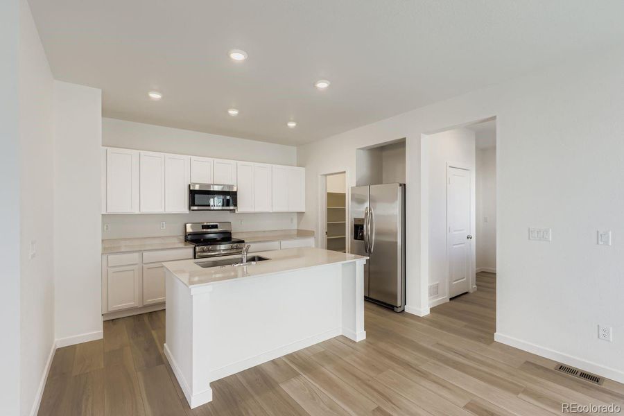 Furnished interior view inside a new home in , Thornton (Image 6). Furnished interior view inside a new home in , Thornton (Image 6).