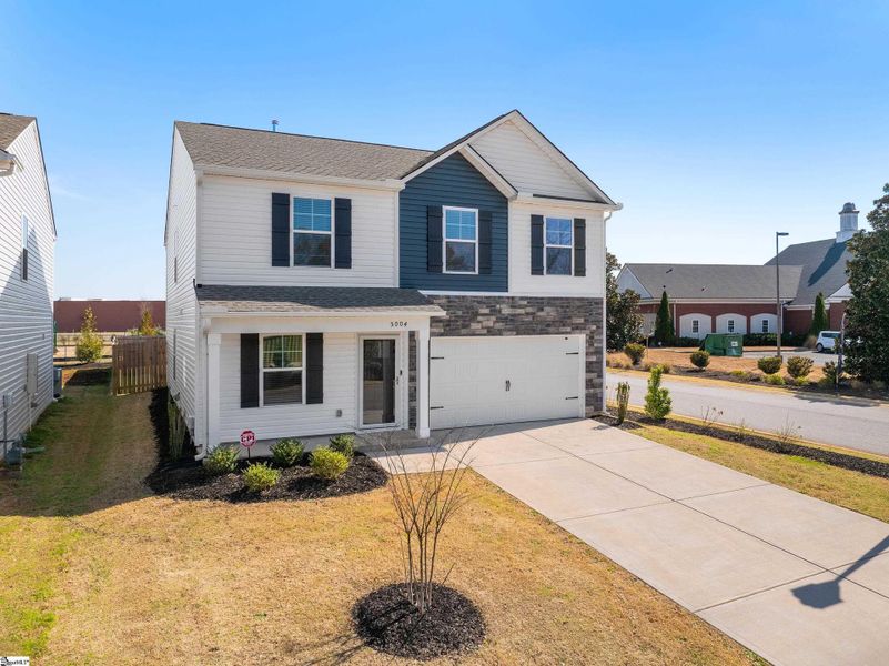 Front exterior of a new home in Hazelwood, Boiling Springs, SC, highlighting curb appeal (Image 2). Front exterior of a new home in Hazelwood, Boiling Springs, SC, highlighting curb appeal (Image 2).