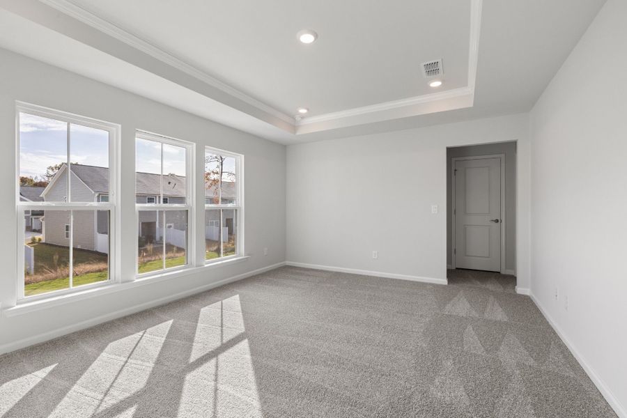 Spacious, unfurnished interior of a new home in Poets Walk, Whitsett (Image 21).