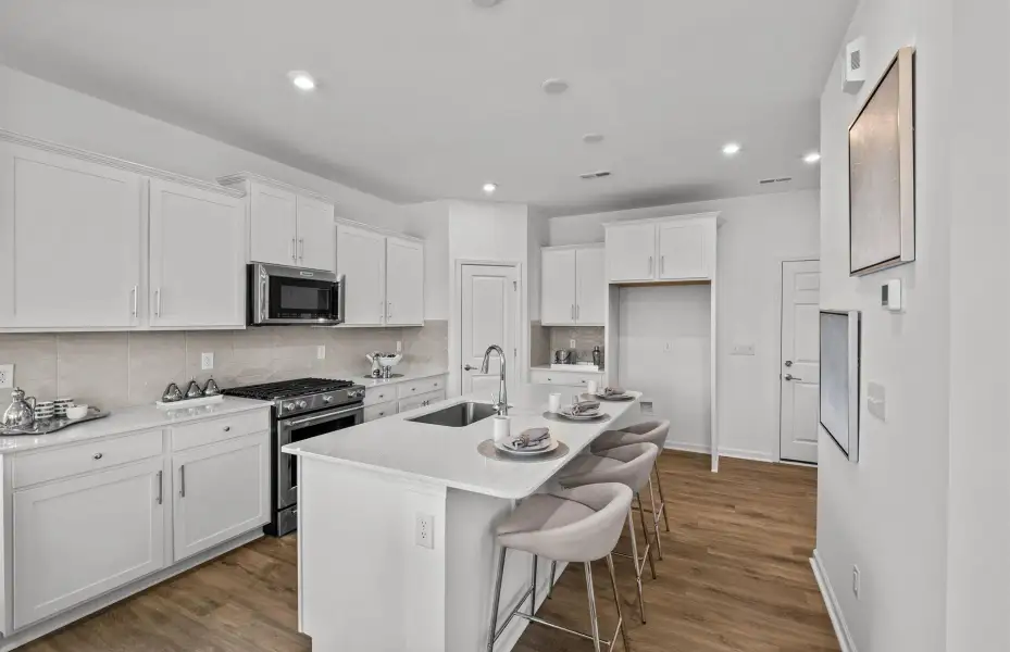 Furnished interior view inside a new home in Riverstone, Monroe (Image 12).