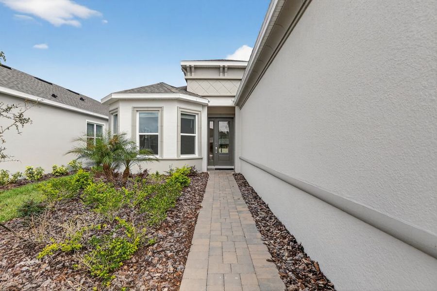 Exterior details and patio area of a home in Center Lake Ranch Community Group Page, St. Cloud (Image 21).